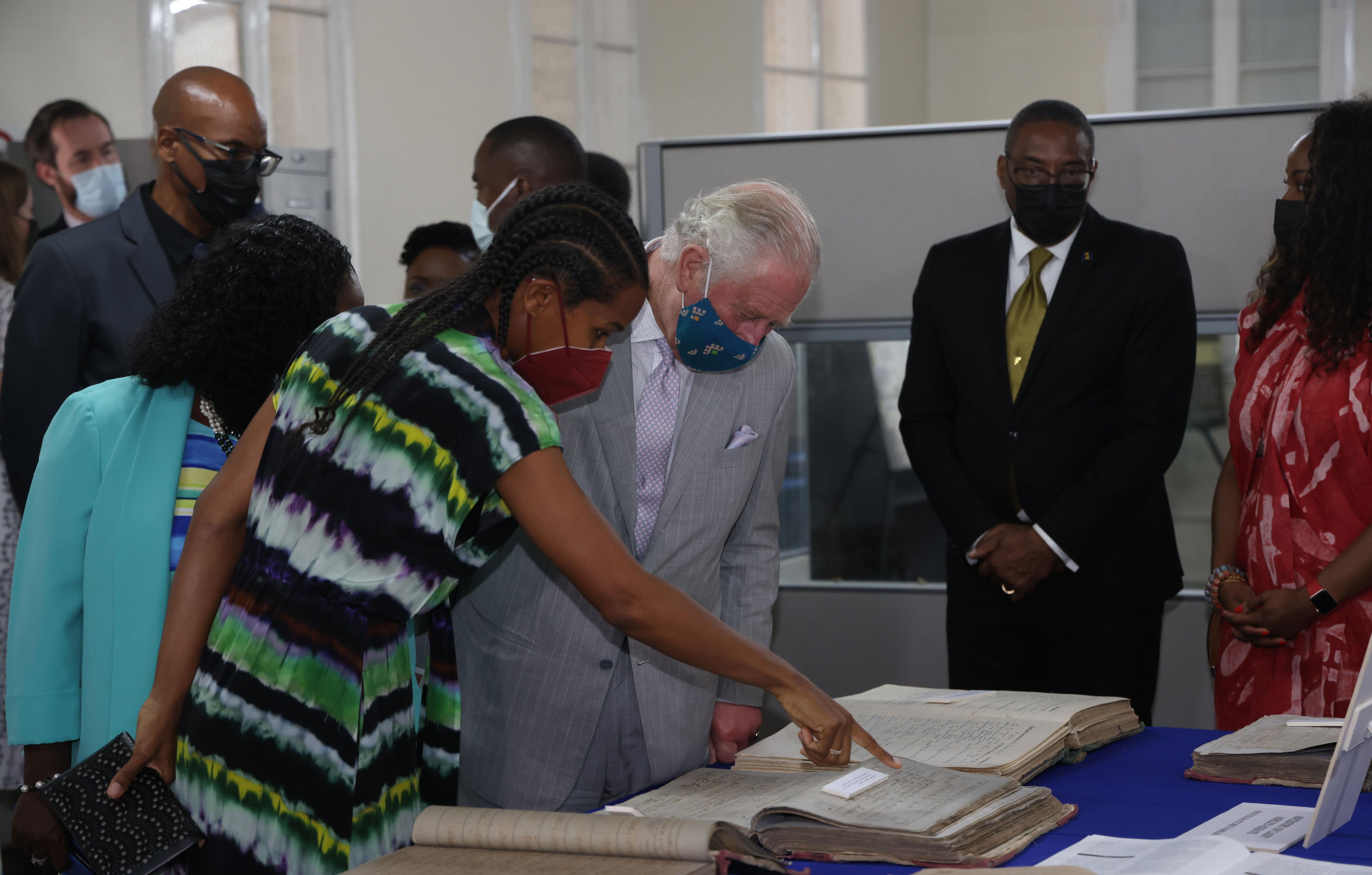 prince charles visits the national archives of barbados